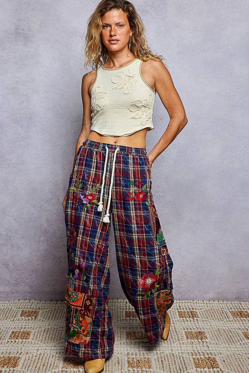Round neck with embroidered detail sleeveless top